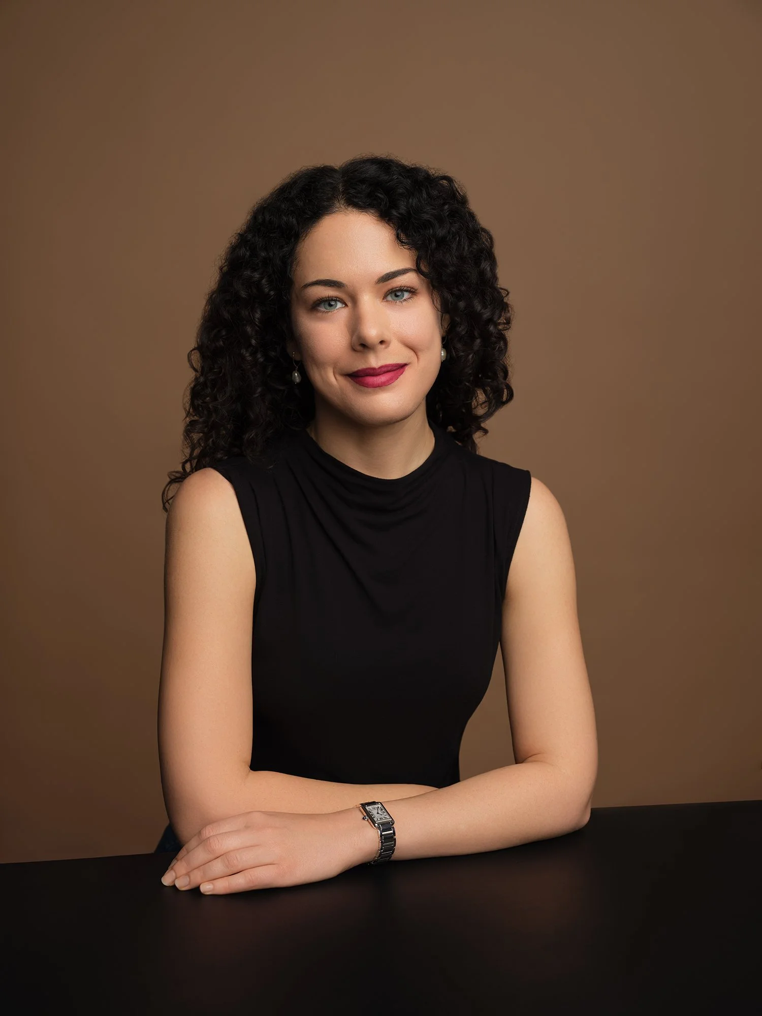 Corporate profile picture for a law partner: tailored suit, symmetrical pose, precise detail. Law firm headshots and corporate headshot photos in Manhattan.