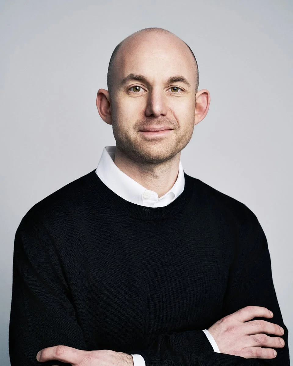 executive-portrait-nyc-bald-man-black-sweater.jpg