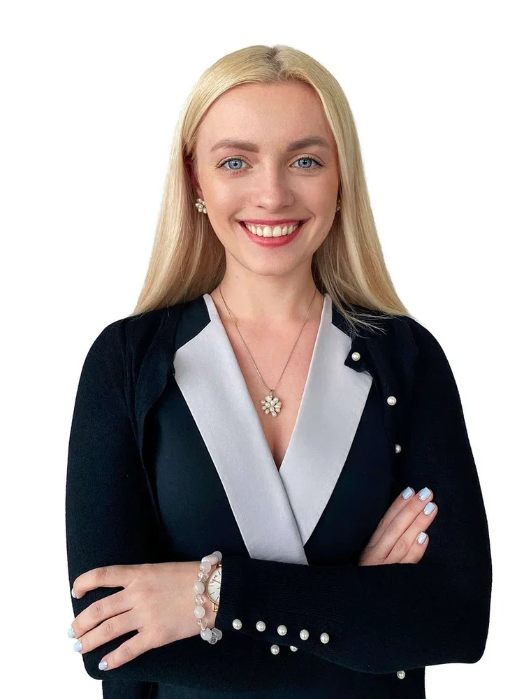 NYC corporate headshot of a senior executive: clean lighting, neutral backdrop, professional portrait for LinkedIn and PR.