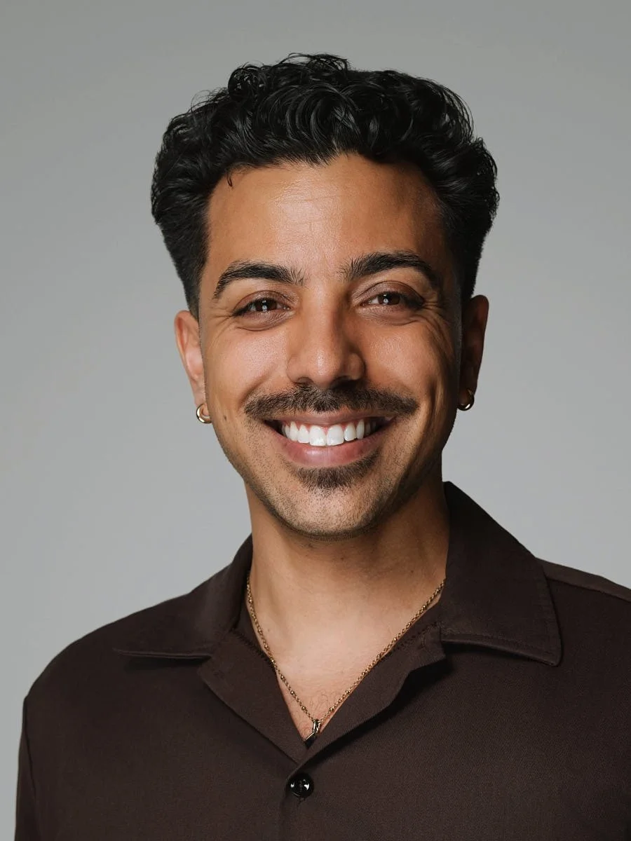 corporate-headshot-nyc-man-brown-shirt-gray-background.jpg