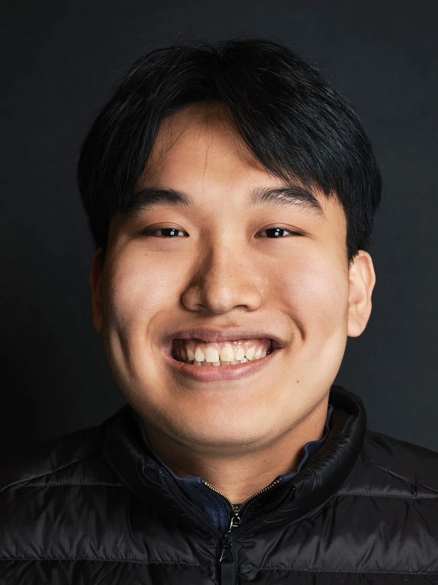 professional-headshot-nyc-young-man-navy-zip.jpg