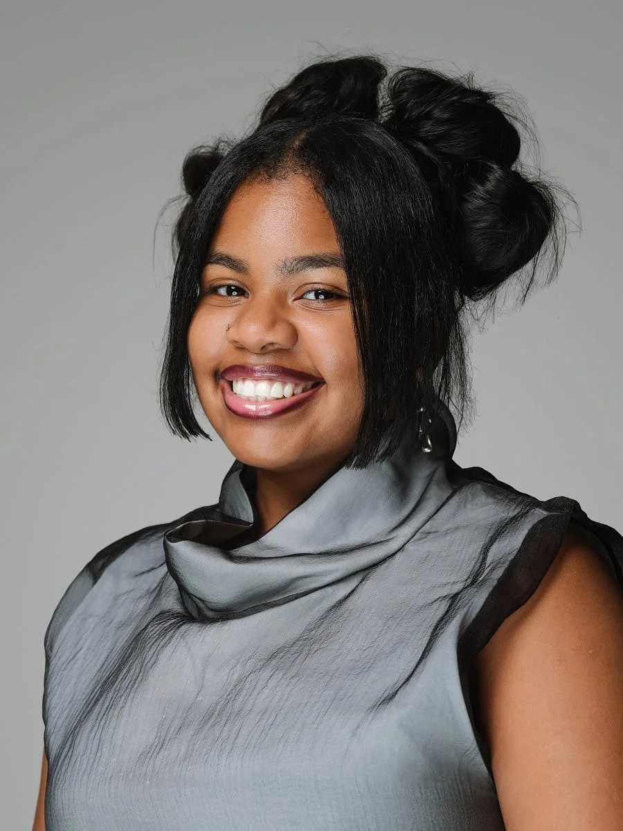 corporate-headshot-nyc-woman-white-sweater-light-background.jpg