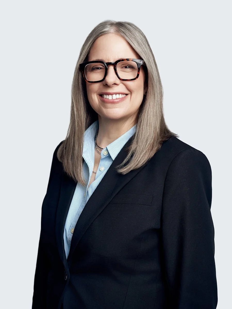executive-portrait-nyc-woman-glasses-navy-blazer.jpg